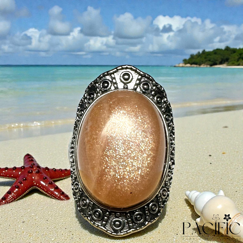 Bague en pierre de lune pêche AAA en argent 925, vue de face, taille ajustable, éclat sacré.