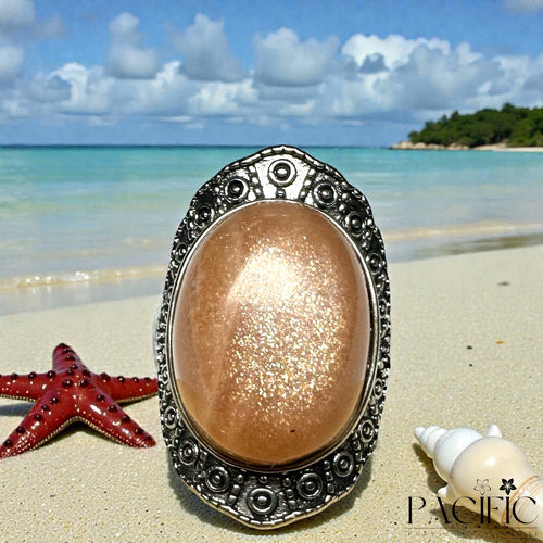 Bague en pierre de lune pêche AAA en argent 925, vue de face, taille ajustable, éclat sacré.